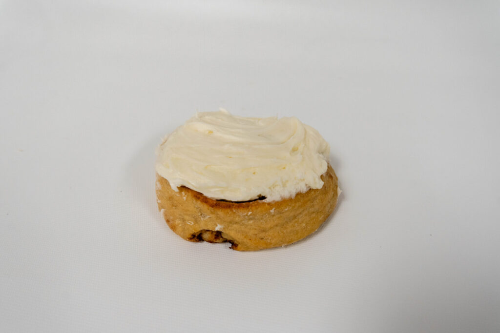 Old Fashioned Cinnamon Roll with rich cinnamon swirls and a light glaze, baked to a golden brown for a classic homemade look.