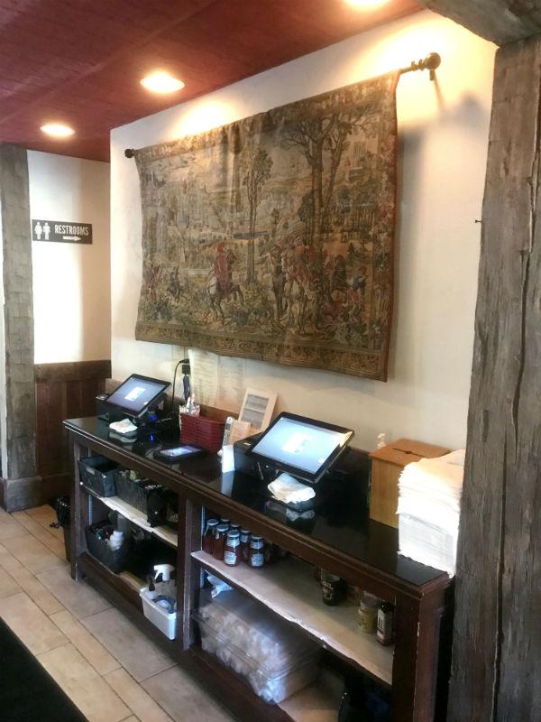 Medieval Brussels tapestry hanging in a pub